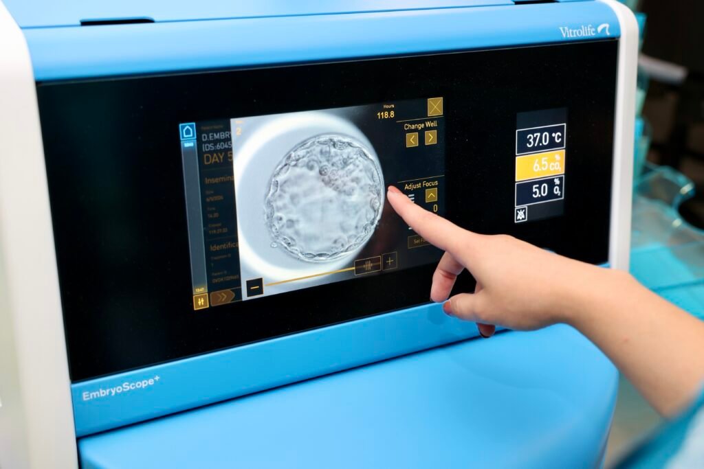 A specialist at the Embryolab clinic in Thessaloniki shows a fertilized egg cell during laboratory analysis